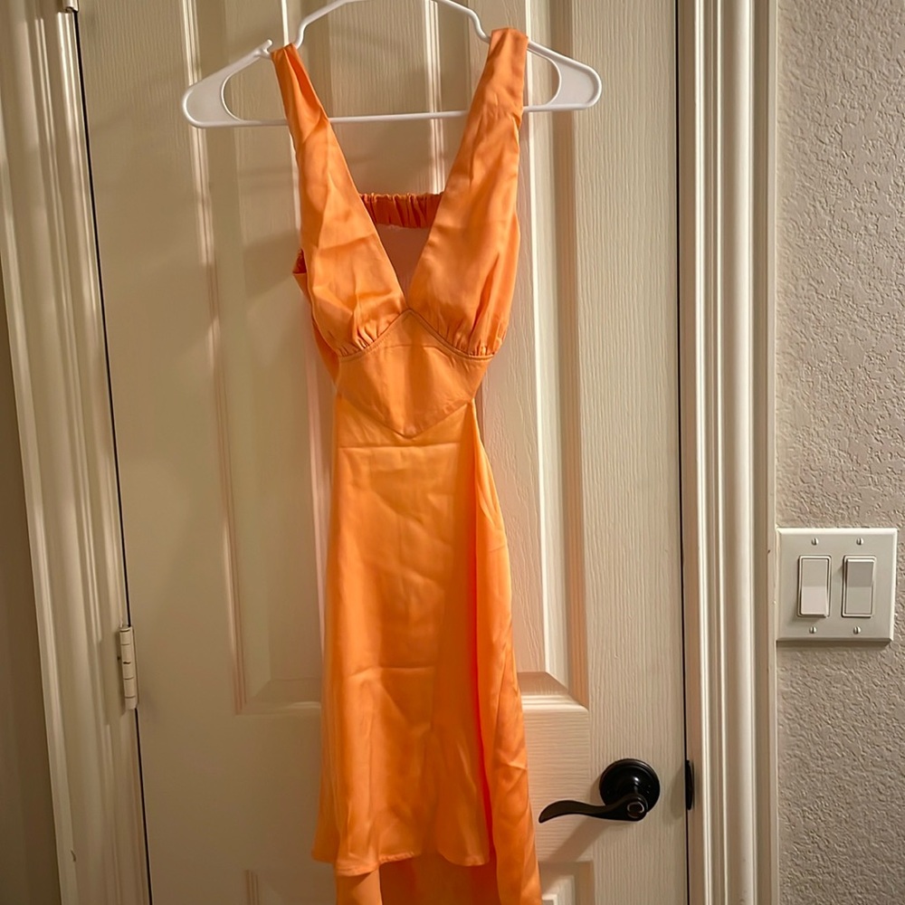 Orange floral mini dress with open back